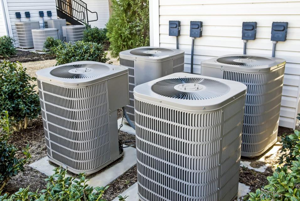 A bank of residential condensing units installed by Conditionaire